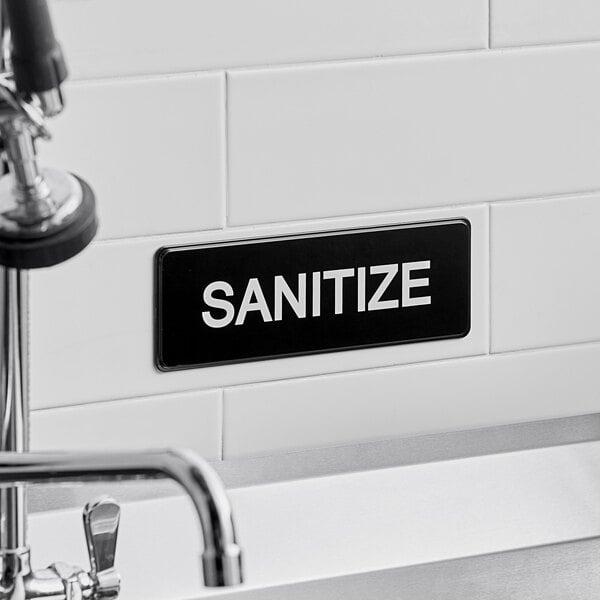 Lavex Sanitize Sign - Black and White, 9" x 3" (Each)